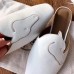Hermes Tangeria Mules In White Calfskin